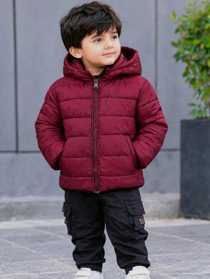 Marron color kid's puffer jacket.