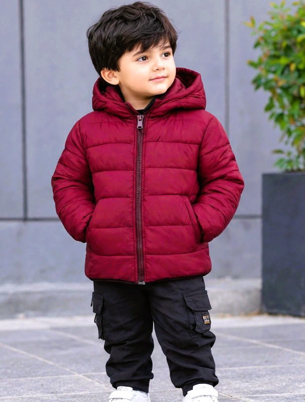 Marron color kid's puffer jacket.