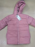 Girl's puffer jacket pink color.